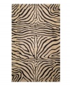 Journey to the savannah. The stunning Seville collection produces a dramatic textural effect and visual undulations by combining hand carving and hooking techniques with color blending and ombre shading. Rich beige and black contrast to produce a striking zebra pattern. Exotic, contemporary chic.