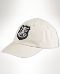 A classic baseball cap is crafted from washed surplus chino with bold cricket-inspired embroidery, making it the ultimate accessory for sporty style. A classic baseball cap is crafted from washed surplus chino with bold cricket-inspired embroidery, making it the ultimate accessory for sporty style.