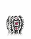 Nestled in a sterling silver cable charm, bezel-set rhodolite stones sparkle and shine. By PANDORA.