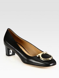 This classic leather silhouette is upgraded with a goldtone metal heel and large buckle. Metal heel, 1½ (40mm)Leather upperSquare toeLeather lining and solePadded insoleMade in ItalyOUR FIT MODEL RECOMMENDS ordering one half size up as this style runs small. This classic leather silhouette is upgraded with a goldtone metal heel and large buckle. Metal heel, 1½ (40mm)Leather upperSquare toeLeather lining and solePadded insoleMade in ItalyOUR FIT MODEL RECOMMENDS ordering one half size up as this style runs small.