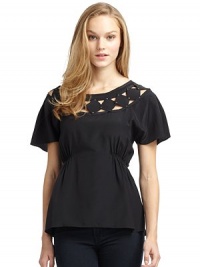 THE LOOKDiamond-shaped cutouts with stud detailsCinched sidesGently ruffled back hemTHE FITAbout 23 from shoulder to hemTHE MATERIALSilkCARE & ORIGINDry cleanImportedModel shown is 5'8 (172½cm) wearing US size Small. THE LOOKDiamond-shaped cutouts with stud detailsCinched sidesGently ruffled back hemTHE FITAbout 23 from shoulder to hemTHE MATERIALSilkCARE & ORIGINDry cleanImportedModel shown is 5'8 (172½cm) wearing US size Small.