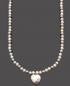 Pretty in pearls. This polished strand necklace features a delicate heart pendant. Crafted from multicolored cultured freshwater pearls (6-7 mm) with a sterling silver clasp. Approximate length: 18 inches. Approximate drop: 1 inch.