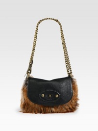 Indulge in this petite fox fur and leather style that is crafted to perfection.Detachable convertible chain shoulder strap, 11-20 dropTurnlock flap closure8W X 6H X 1½DImported Indulge in this petite fox fur and leather style that is crafted to perfection.Detachable convertible chain shoulder strap, 11-20 dropTurnlock flap closure8W X 6H X 1½DImported