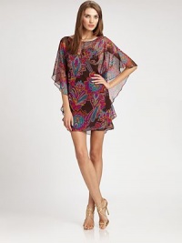 Airy chiffon, patterned with a vibrant, exotic print.Jewel necklineElbow-length kimono sleevesIncluded slipAbout 20 from natural waistPolyesterDry cleanMade in USAModel shown is 5'10 (177cm) wearing US size 4. Airy chiffon, patterned with a vibrant, exotic print.Jewel necklineElbow-length kimono sleevesIncluded slipAbout 20 from natural waistPolyesterDry cleanMade in USAModel shown is 5'10 (177cm) wearing US size 4.