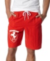 Pick up some sleek speed while riding the waves in these racing-inspired Ferrari board shorts from Puma.