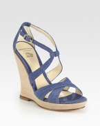Delectable denim with a dainty, adjustable ankle strap and stacked wooden wedge. Stacked wooden wedge, 5 (125mm)Covered platform, ¾ (20mm)Compares to a 4¼ heel (110mm)Denim upperLeather liningBuffed leather solePadded insoleImportedOUR FIT MODEL RECOMMENDS ordering true size. 