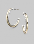From the Crossover Collection. An arc of sterling silver crisscrosses one of 18k yellow gold in graceful half hoops. Sterling silver and 18k yellow gold Diameter, about 1 Post back