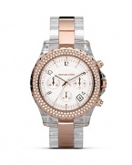 The chronograph is the new face of time. Here, from MICHAEL Michael Kors the rose goldplated watch is accented with crystal embellished bezel. With three-eye design and sweep second hand. Finished with a two-tone bracelet strap.