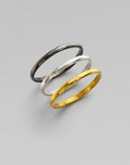 From the Skittle Collection. A set of three hammered rings - blackened and white sterling silver and 24k yellow gold - look as divine worn together as they do apart.24k yellow gold Sterling silver Imported
