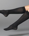 Classic velvet-soft knee-highs in an opaque and matte look. Comfortable wide band Opaque 50 denier Nylon/elastene; hand wash Imported