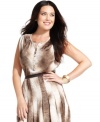 Jones New York Collection's snakeskin-print plus size blouse is an instant classic for your work wardrobe. (Clearance)