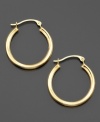 Polished hoop earrings crafted in 14k gold are the perfect addition to your everyday look. Approximate diameter: 1/2 inches.