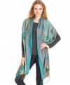 Take your style up a notch with this pretty paisley wrap by Collection XIIX.