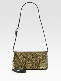 A convertible bag rendered in supple leather and leopard-print calf hair will easily transition from day to night. Adjustable detachable leather shoulder strap, 10½-12½ dropDetachable chain and leather wristlet, 7½ dropMagnetic snap closure on front flapThree inner compartmentsOne inside zip pocketOne inside open pocketCotton lining8W X 4½H X ¾DImported