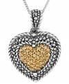 The look of love. Genevieve & Grace's heart shaped pendant is crafted from sterling silver with marcasite and round-cut champagne crystals (1 mm) providing a stylish touch. Approximate length: 18 inches. Approximate drop length: 1-1/4 inches. Approximate drop width: 7/8 inch.