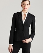 Define modern design in this BOSS Black blazer, teaming clean lines with slim tailoring for a sharp, strong silhouette. Pair with fitted trousers for a feminine update on classic menswear suiting.