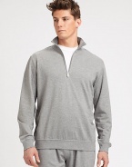 EXCLUSIVELY OURS. Whether gym-bound or for weekend-wear, this pullover style is designed for maximum comfort in superbly soft cotton.Half-zip frontStand collarBanded cuffs and hemCotton/modalHand washImported
