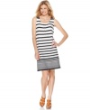 Beach-inspired stripes offer a crisp touch to this sleeveless dress from J Jones New York.