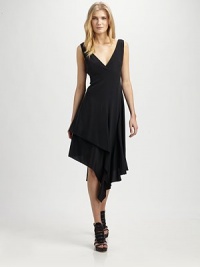 Sophisticated edginess, this crepe de chine dress features an eye-catching plunging neckline and a dramatic, asymmetrical hem. V-necklineSleevelessAsymmetrical hemConcealed back zipperFully linedAbout 45 from shoulder to hem92% silk/8% elastaneDry cleanImported Model shown is 5'11½ (181cm) wearing US size 4. Sophisticated edginess, this crepe de chine dress features an eye-catching plunging neckline and a dramatic, asymmetrical hem. V-necklineSleevelessAsymmetrical hemConcealed back zipperFully linedAbout 45 from shoulder to hem92% silk/8% elastaneDry cleanImported Model shown is 5'11½ (181cm) wearing US size 4.
