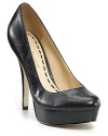 Lightly distressed leather lends an edgy feel to a classic platform pump from Enzo Angiolini.