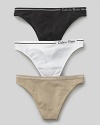 Calvin Klein Underwear seamless thong. A comfortable seamless thong with logo and stripe detail on waistband. Cotton gusset. Style #D2220