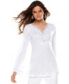 Jeweled accents create a dramatic effect on INC's appealing tunic top! Linen fabric gives this long-sleeved style a lightweight, airy feel.