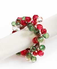 Dress up simple linens for a seasonal bash with napkin rings strung with sparkling beads. Shades of red and green complete a memorable holiday table. Dress up simple linens for a seasonal bash with napkin rings strung with sparkling beads. Shades of red and green complete a memorable holiday table.