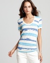 Ultra-soft jersey lends a loved-in vintage feel to this brightly striped ALTERNATIVE tee.
