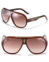 Sleek stripes race through a sporty aviator silhouette from Carrera.