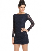 Lace and sequins dazzle on Jump's mini dress. The back is super-low cut for extra sizzle!