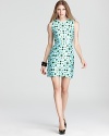A brilliant mod print emblazons a sleek kate spade new york sheath for an eye-catching silhouette that will energize your 9-to-5 style. Team with white pumps and over-sized pearls to reign in the retro look.