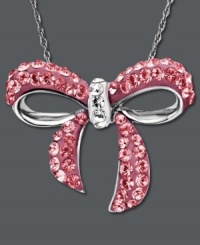 Pretty in pink. Kaleidoscope's adorable bow pendant shines in pink and clear crystal with Swarovski elements. Set in sterling silver. Approximate length: 18 inches. Approximate drop: 9/10 inch. Pretty in pink. Kaleidoscope's adorable bow pendant shines in pink and clear crystal with Swarovski elements. Set in sterling silver. Approximate length: 18 inches. Approximate drop: 9/10 inch.