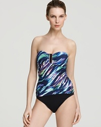 Vibrant stripes with electric appeal send sparks flying on this La Blanca one-piece swimsuit--a solid bottom gives the illusion of a two-piece suit. Vibrant stripes with electric appeal send sparks flying on this La Blanca one-piece swimsuit--a solid bottom gives the illusion of a two-piece suit.
