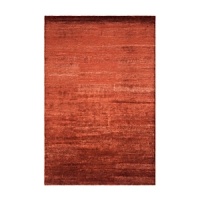 Inspired by the luster of European velvet, artisans create this Ralph Lauren rug's rich heathered texture by blending long threads of different hand-spun yarns--a technique known as abrash.Available in five spice hued colorways. Inspired by the luster of European velvet, artisans create this Ralph Lauren rug's rich heathered texture by blending long threads of different hand-spun yarns--a technique known as abrash.Available in five spice hued colorways.