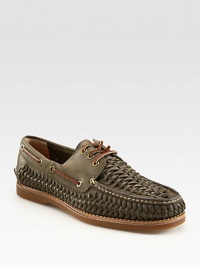 Exquisite woven detail defines the look and design of this classic boat shoe, constructed in fine leather.Leather upperLeather liningPadded insoleRubber soleImported Exquisite woven detail defines the look and design of this classic boat shoe, constructed in fine leather.Leather upperLeather liningPadded insoleRubber soleImported