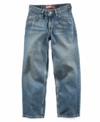 The classic look of a straight-leg jean in a relaxed fit with room to move. The classic look of a straight-leg jean in a relaxed fit with room to move.