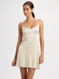 Silky, feminine piece can be worn as a slip or as sleepwear for soft comfort between the sheets.V-neckline Adjustable shoulder straps About 33½ from shoulder to hem 91% viscose/9% Lycra; machine wash Imported Silky, feminine piece can be worn as a slip or as sleepwear for soft comfort between the sheets.V-neckline Adjustable shoulder straps About 33½ from shoulder to hem 91% viscose/9% Lycra; machine wash Imported