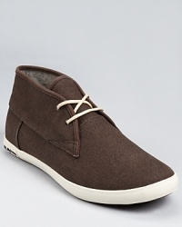 Minimal design elements come together in this clean, comfortable Chukka boot sneaker, a perfect finish for your relaxed and refined look. Minimal design elements come together in this clean, comfortable Chukka boot sneaker, a perfect finish for your relaxed and refined look.