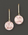 Pavé diamonds and rose quartz sparkle in an 18K yellow gold setting.