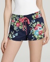 Pretty floral sleep shorts with a stretch waistband and drawstring closure.