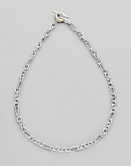 Sterling silver and 18k gold small figaro chain. Toggle closure 18 long Imported