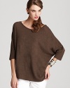 A basic staple get a stylish lift with this soft Vince tee rendered in earthy brown and featuring dolman three-quarter sleeves for a modern touch.