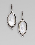 A simply chic design with an oval mother-of-pearl doublet surrounded by a delicate band of dots. Mother-of-pearl doubletsSterling silverEurowire backLength, about ¾Imported 