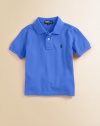 Classic, short-sleeve cotton mesh polo with embroidered polo pony on the chest. Ribbed polo collar and armbands Button placket Machine wash Imported