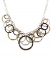 The chic circular design of Alfani's shaky frontal necklace is sure to be a conversation piece! Crafted in shiny silver tone, matte gold tone and hematite tone mixed metals, it will work with nearly everything in your wardrobe. Approximate length: 17 inches + 3-inch extender. Approximate drop: 4 inches.