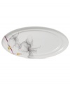 A natural at modern tables, the Aliza Gris oval platter from Mikasa creates a serene landscape for casual dining. White porcelain with watercolor florals is sleek and elegant in form, but offers everyday durability.