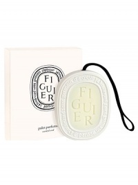 An innovative new way to scent your surroundings,specifically designed for small spaces; wardrobe, drawers. The porcelain pendent contains a highly scented hard wax palette that will gradually releases its scent for 2-3 months or longer. The pendent is fitted with a ribbon for hanging purposes. Figuier (fig tree) recalls thescent of fig trees warmed by the sun, all parts of the fig tree are represented; the fig wood, the freshness of the leaves and the milky sap. 