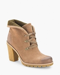 UGG® Australia steps into the lace up booties trend in high style, on wearable lugged heels. UGG® Australia steps into the lace up booties trend in high style, on wearable lugged heels.