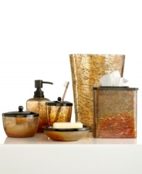 On fire. In spicy orange and gold hues, this Lava tissue holder lights up your space with vibrant color and and a beautiful distressed finished. Crafted of opulent glass. On fire. In spicy orange and gold hues, this Lava tissue holder lights up your space with vibrant color and and a beautiful distressed finished. Crafted of opulent glass.