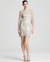 This exquisite Kay Unger lace dress is flecked with sparkling sequins for a dose of glamour.